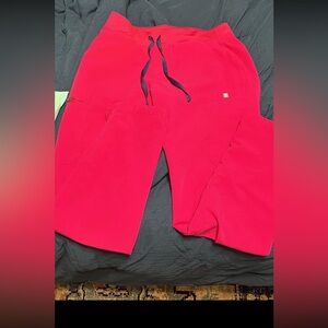 Figs pink scrub pants. Second owner. Accidentally bought the wrong size.